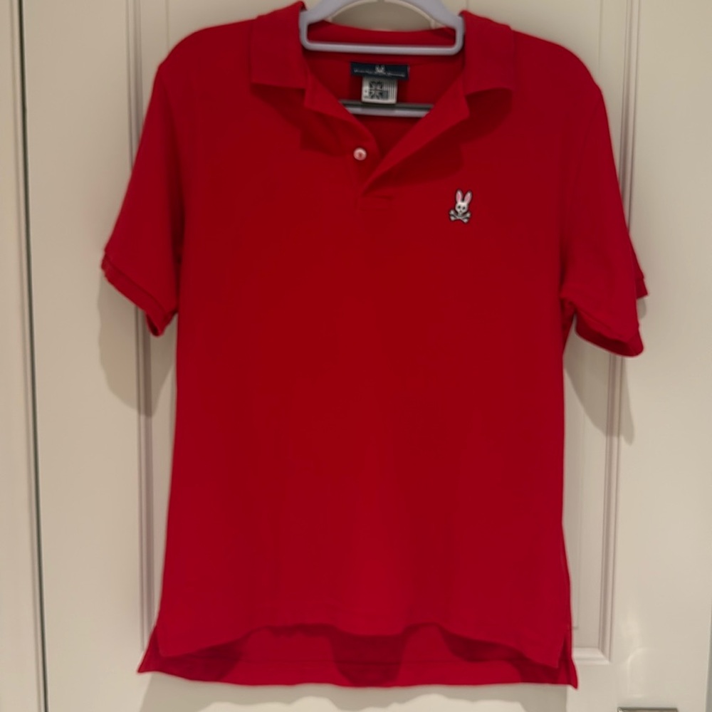Kids size XL Psycho Bunny polo shirt in red.
